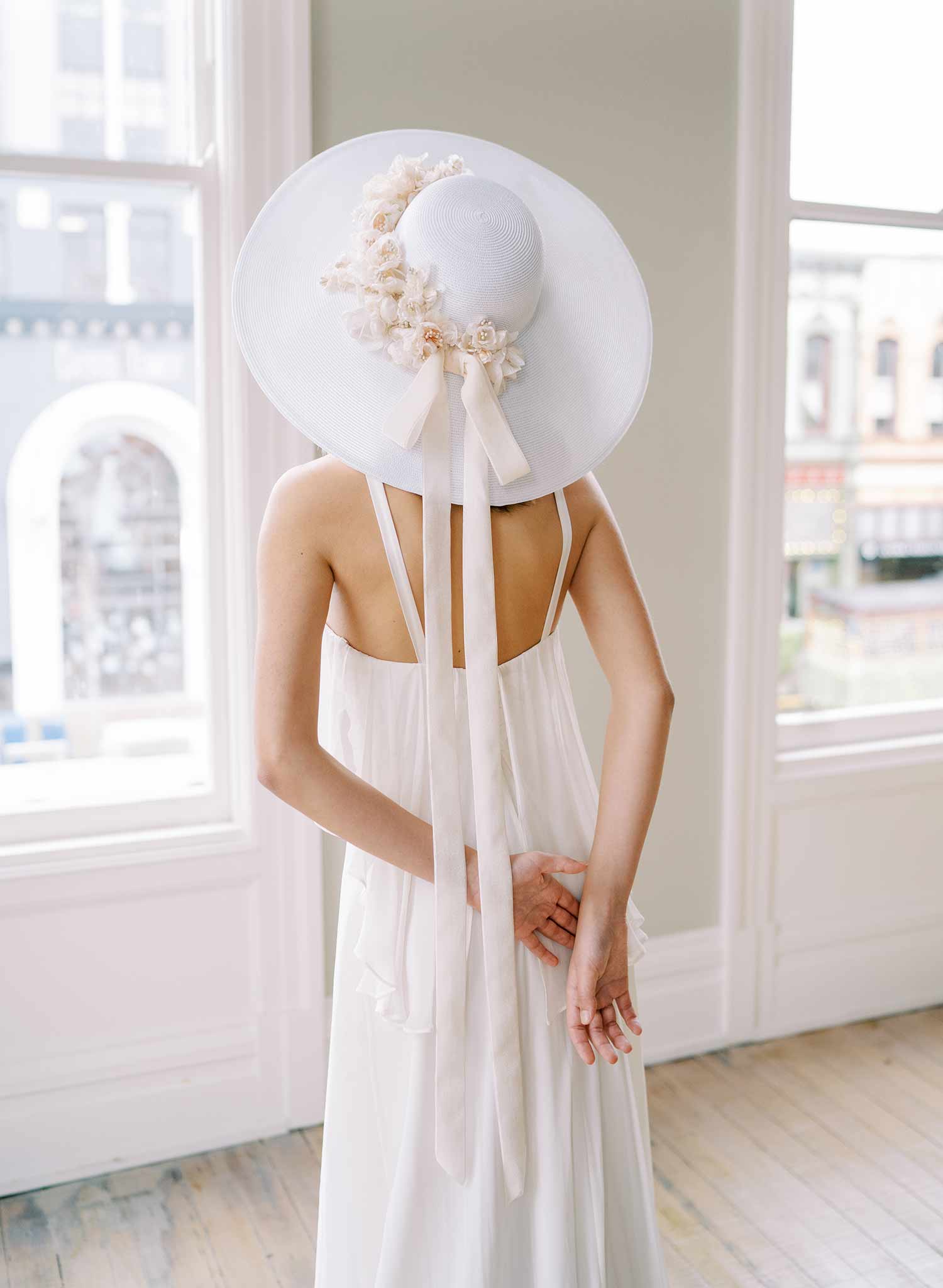 Wedding hat with silk flowers and bow